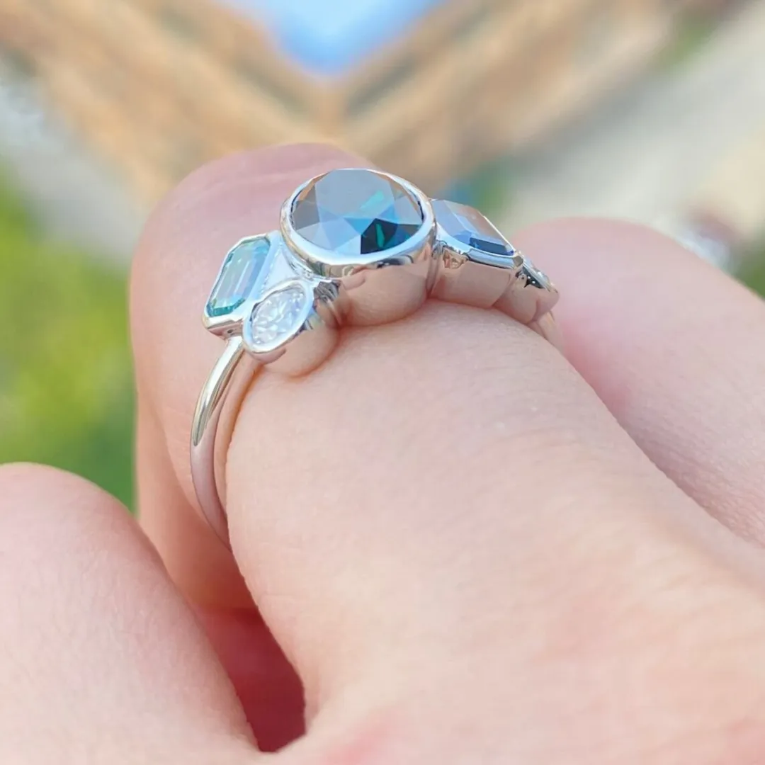 /public/photos/live/Green Oval & Blue Emerald Moissanite Five Stone ring 587 (2).webp